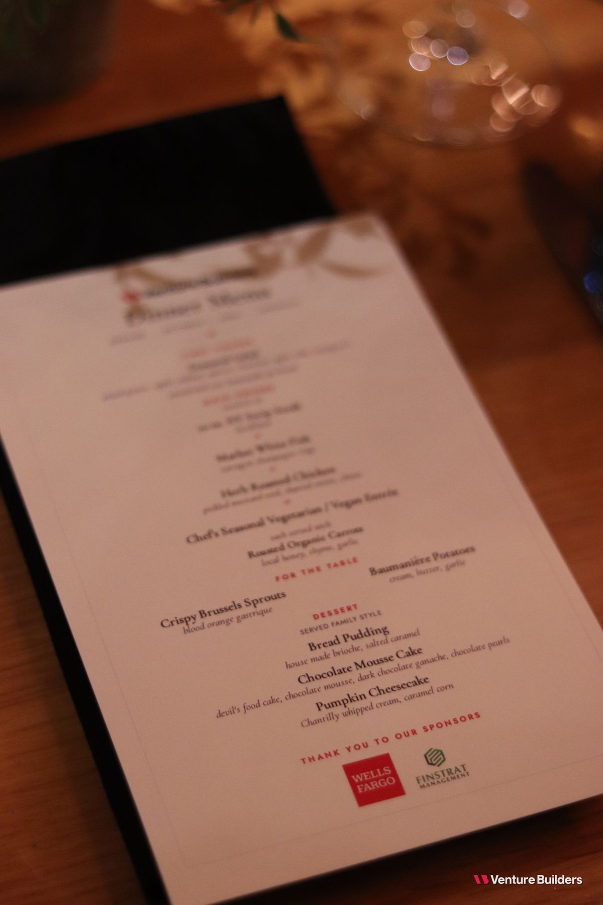 Printed dinner menu thanking the sponsors